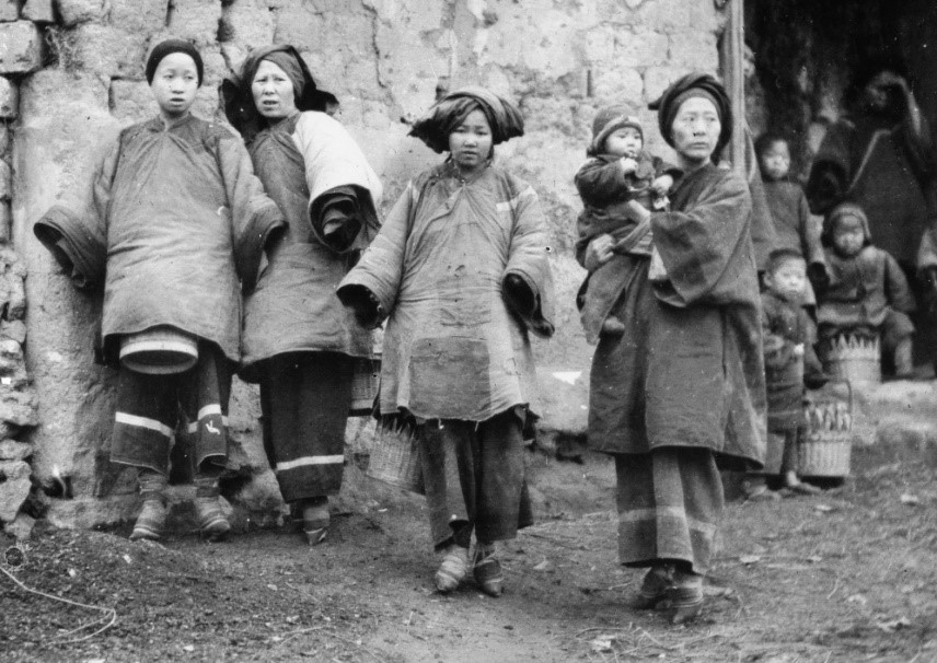 A group of peasant women with lightly bound feet (early 20th century; courtesy of the Library of Congress, LC-DIG-ggbain-08997).