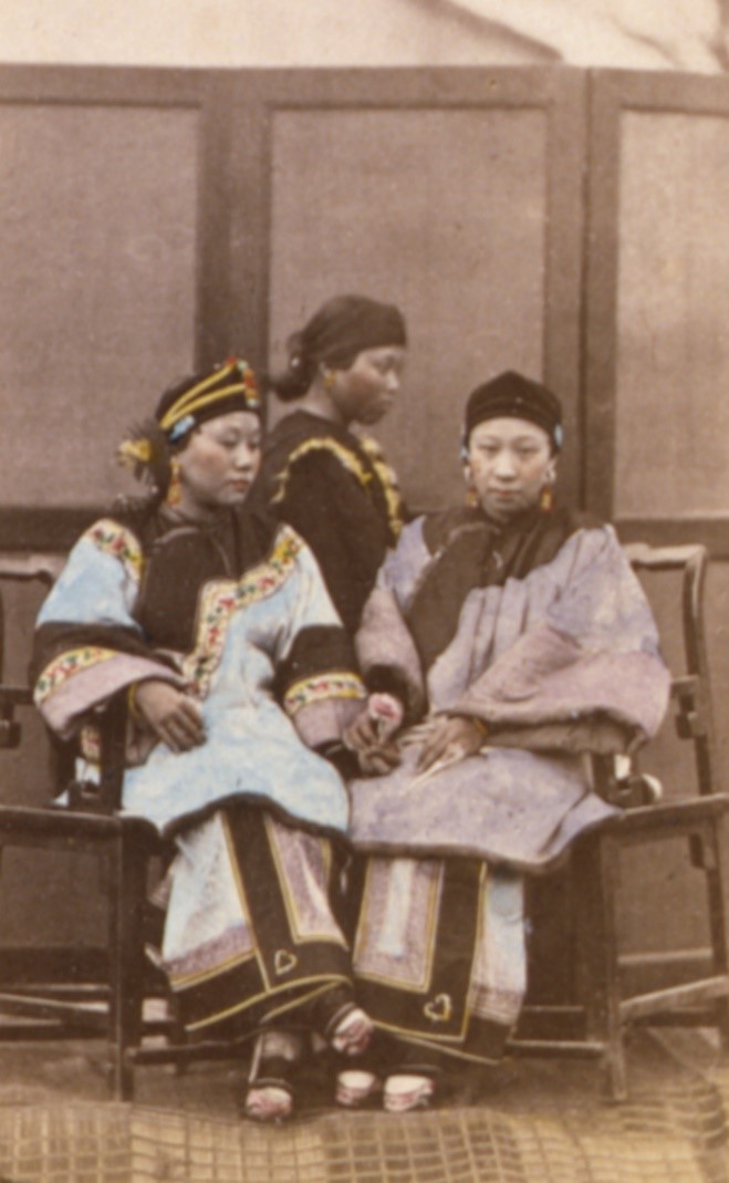 An early tinted photograph of two wealthy Han Chinese women with bound feet (c. 1870; courtesy of the Library of Congress, LC- LC-USZC4-14686).