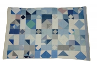 Mennonite relief quilt made in North America and sent to Europe as humanitarian aid for Mennonite refugees from the Ukraine, after the Second World War.