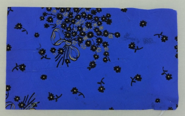 Sample of blue cloth decorated with flock flowers (mid-20th century, Europe).