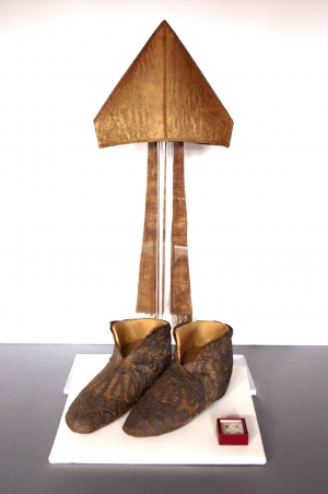 Mitre and slippers flound in the tomb of Archbishop Hubert Walter, who died in AD 1205. Canterbury.