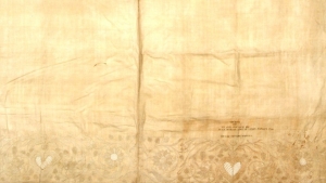 Bedsheet embroidered with possibly hair of decapitated man, England, c. 1716.