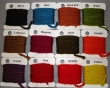 Display of Berlin wool in various colours.