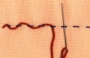 Example of a threaded running stitch.
