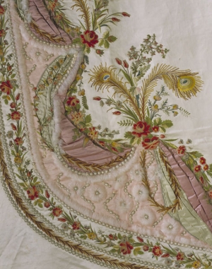 Fragment of a late 18th century French court mantua-style dress. It is made of mbroidered silk satin, with silks, velvet appliqu&eacute;, chenille, metal purl and swansdown.