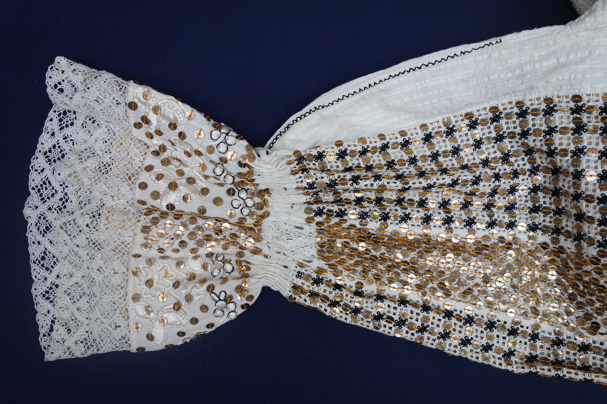 Detail of the woman's blouse from Croatia (TRC 1997.0067).