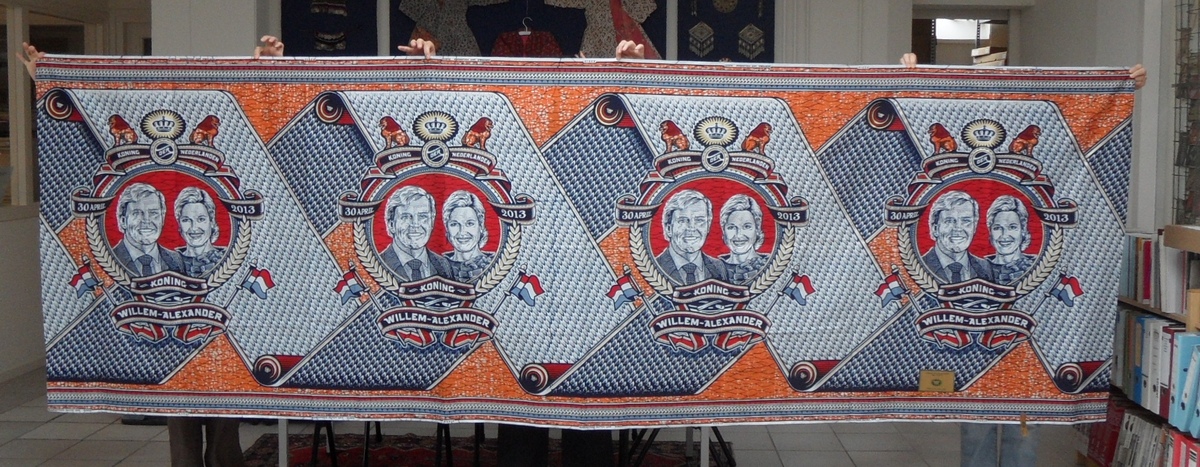 A Vlisco wax print produced on the occasion of the investiture of King Willem Alexander on 30th April 2013 (TRC 2013.0317).