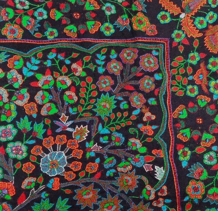 Fragment of a wall hanging from Kerman in southeastern Iran. The style and technique of these Kerman cloths were introduced by craftsmen from Kashmir in the 18th and 19th century (TRC 2014.0457).