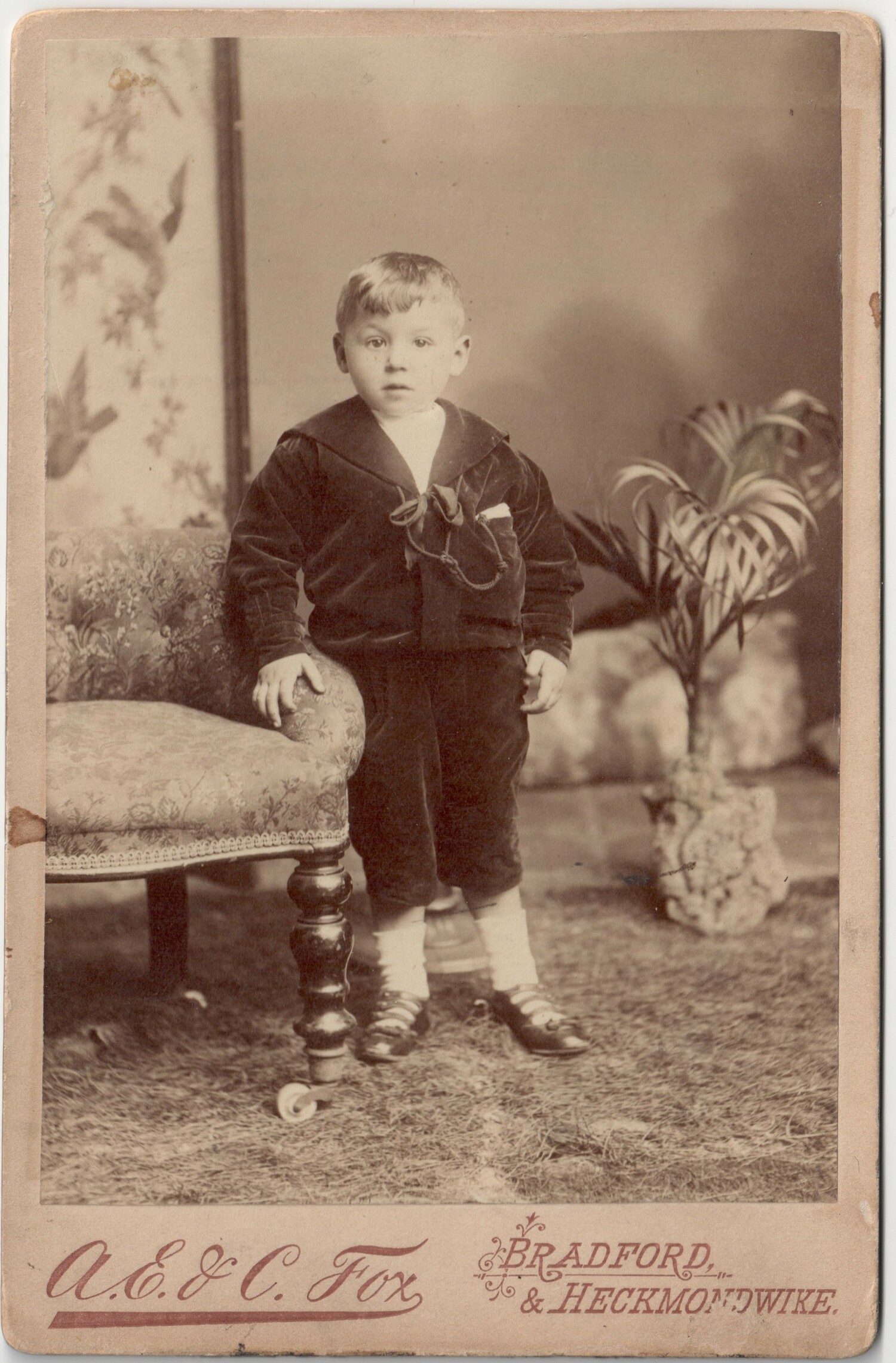 Late 19th century studio photograph of a young boy in sailor's costume, Bradford, Yorkshire, UK (TRC 2019.0001).