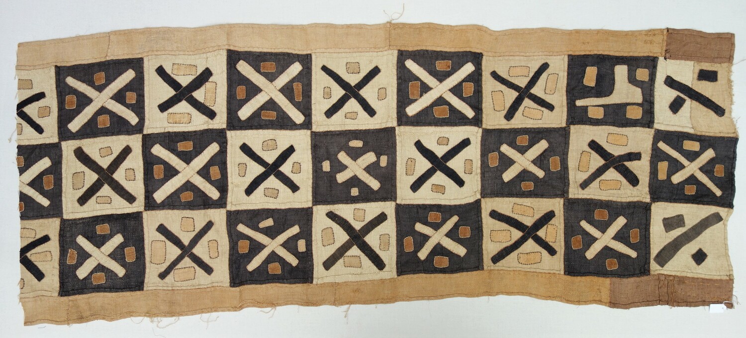 Length of raffia cloth from among the Bushongo (Kuba), with appliqué, embroidery and patchwork decoration. Acquired in 2006, DR Congo (TRC 2020.3881).