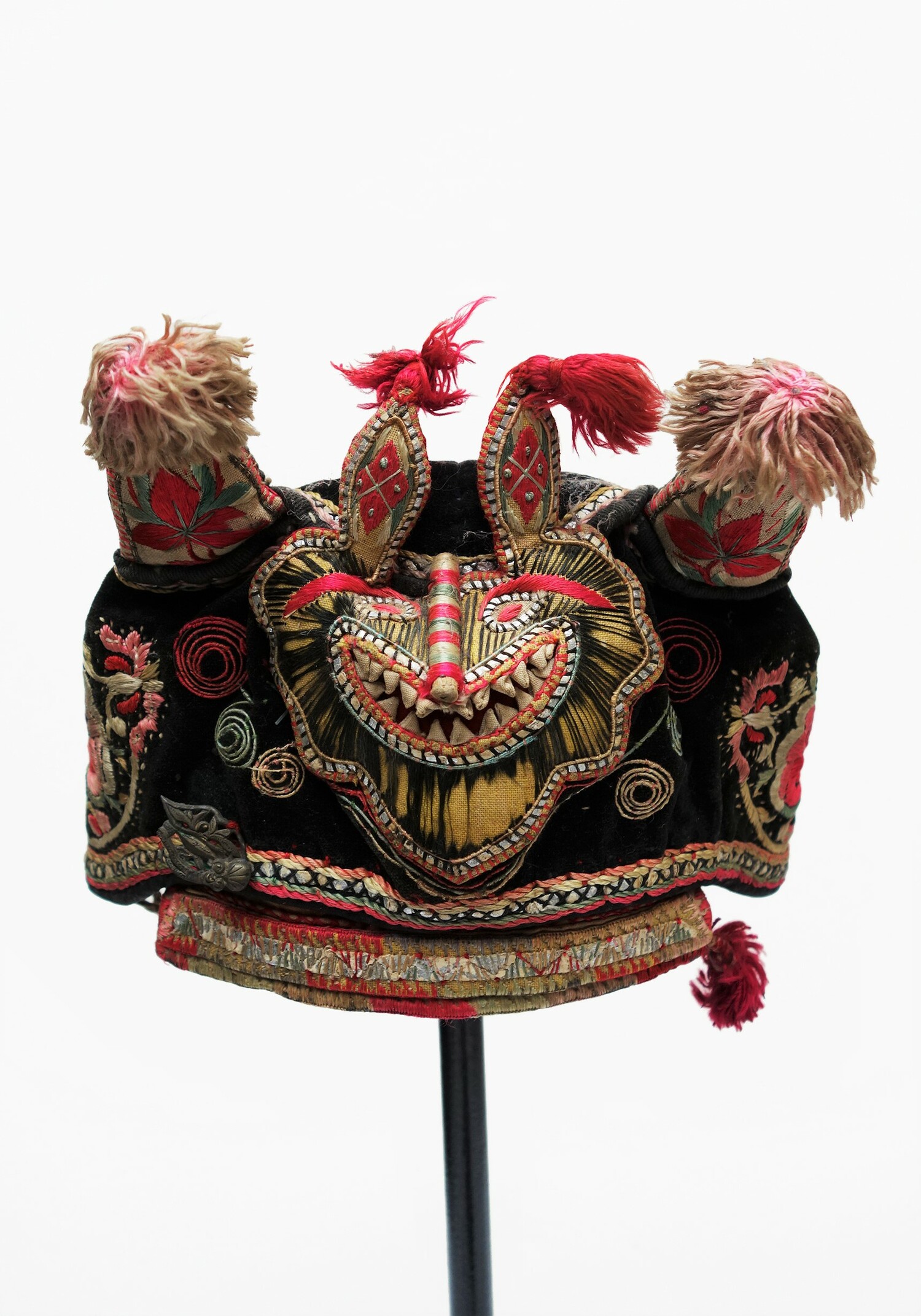 Chinese tiger hat, 20th century (TRC 2021.20360). For a TRC YouTube film, click on the illustration.