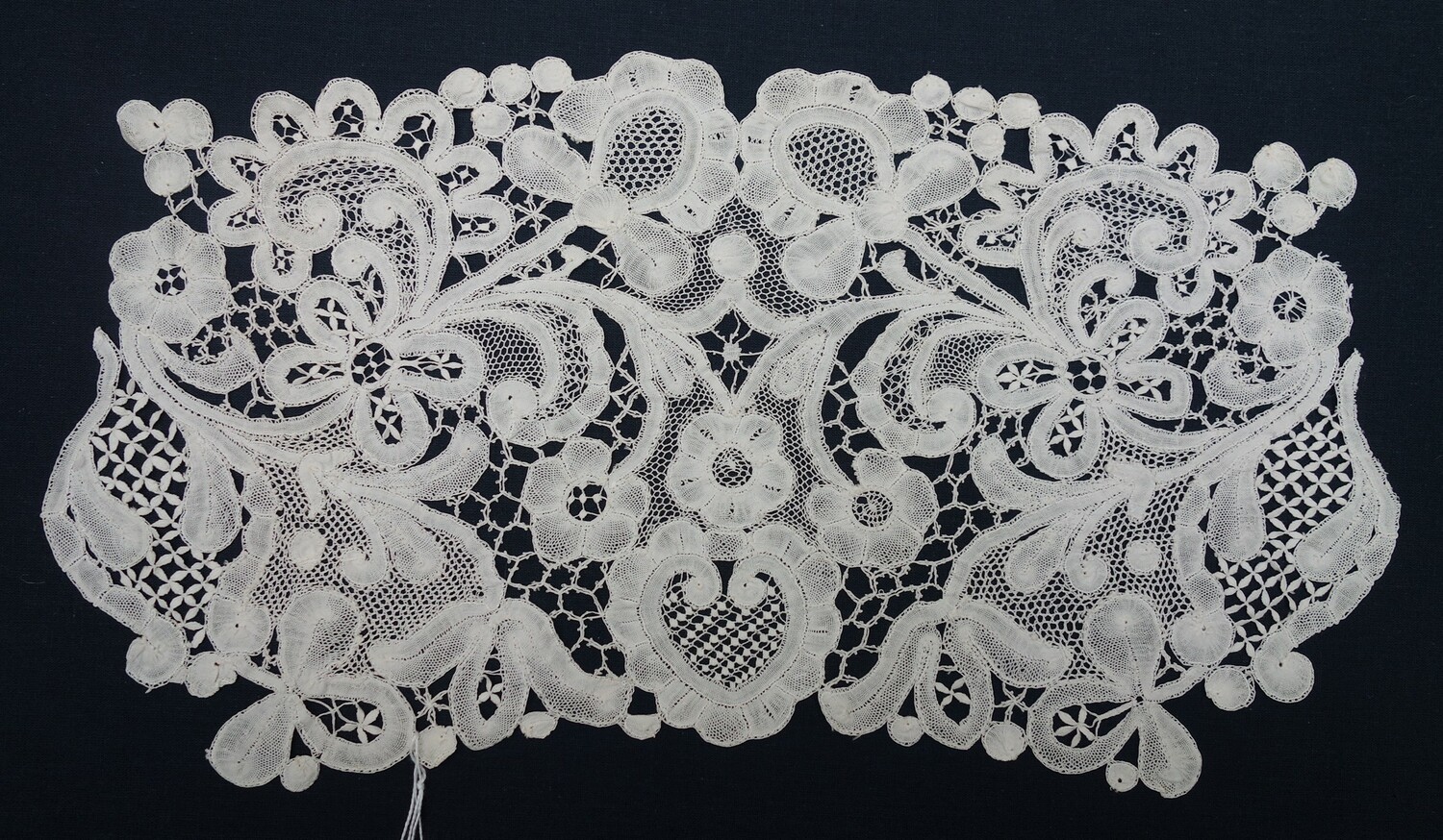 Early 20th century example of linen bobbin lace (TRC 2021.2961).