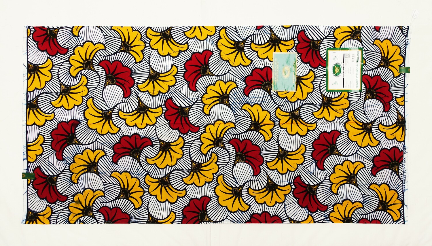 Japanese style ginkgo leaves on cloth produced for West Africa by Vlisco in the Netherlands (2022 (TRC 2022.2261).