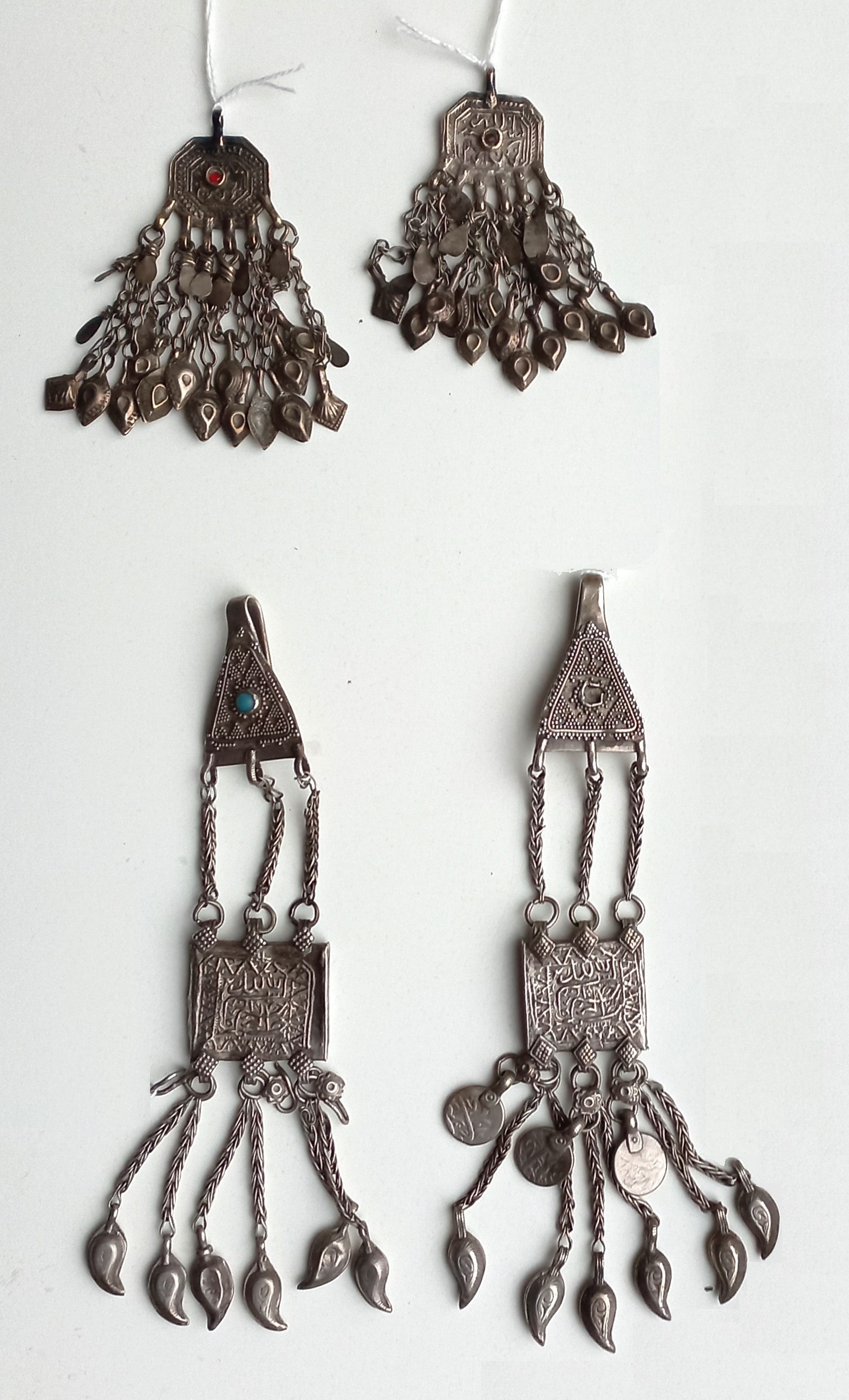 Two pairs of amuletic hangers for a woman's headdress. Afghan, 1960s-1970s (TRC 2024.0342a b and 2024.0343a b).