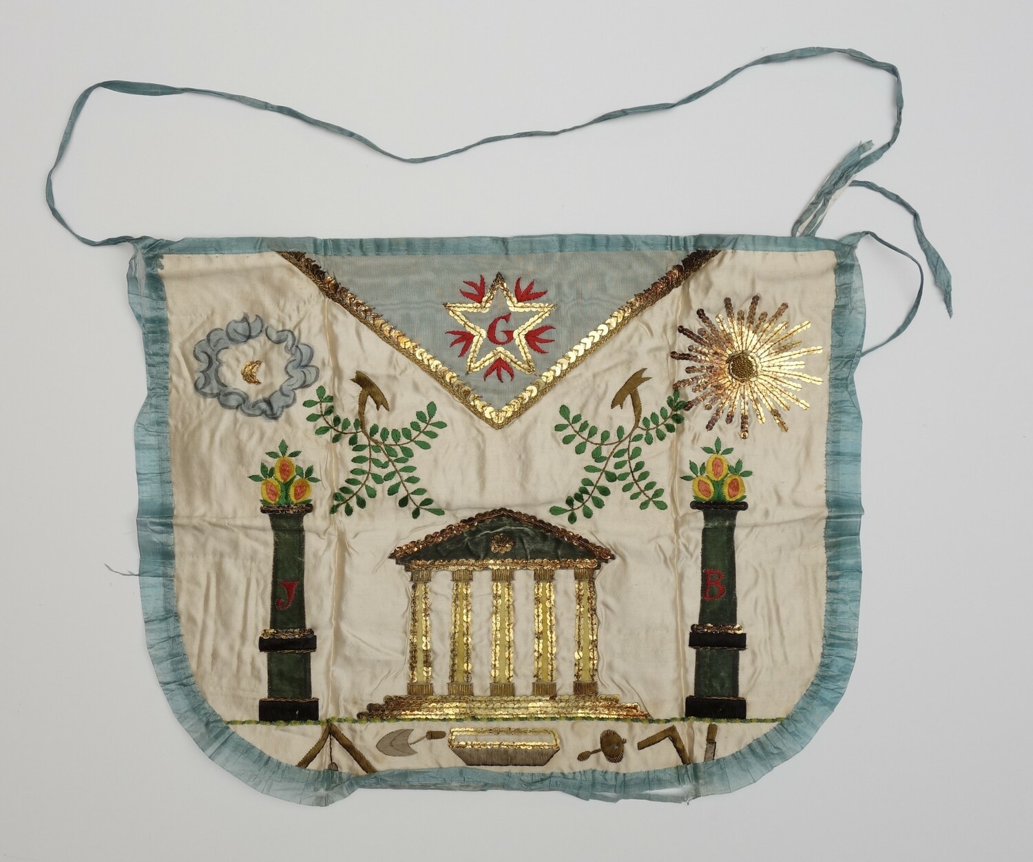 Fig. 12. Nineteenth-century embroidered apron for a member of a masonic lodge (with unlikely, uneven number of pillars). Europe, 19th century (TRC 2024.2250b).