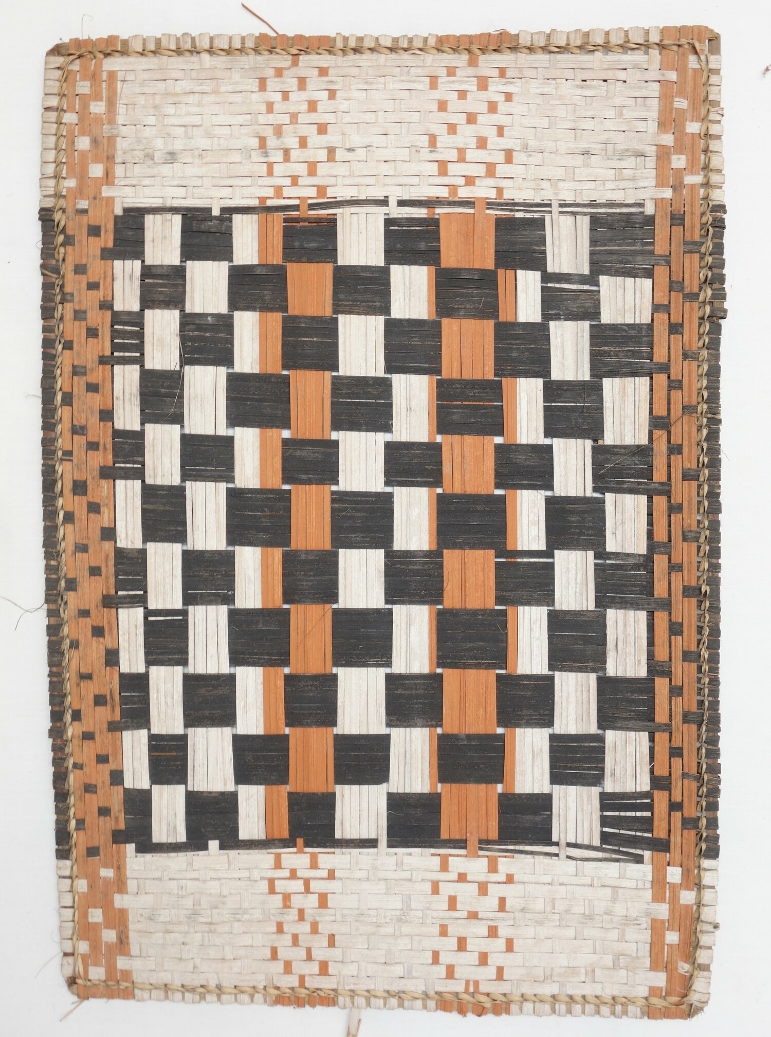 Fig. 1. Woven mat (losa), made from reed or bark, from the Mbola, Democratic Republic of the Congo, late 20th century (TRC 2025.1290).