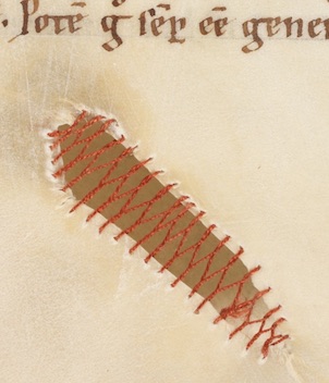 Cretan stitch used to strengthen a parchment hole (Engelberg, Stiftsbibliothek / Cod. 16 – Augustinus, Sermones ad populum diversi / f. 81r).