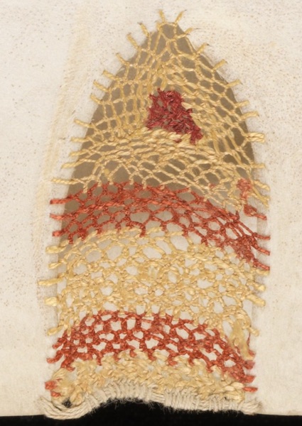 A parchment gap strengthened and decorated with a bar, open buttonhole stitch and Cretan stitch, which create a ‘lacy’, red and yellow stripe and dot pattern (Engelberg, Stiftsbibliothek / Cod. 16 – Augustinus, Sermones ad populum diversi / f. 139r).
