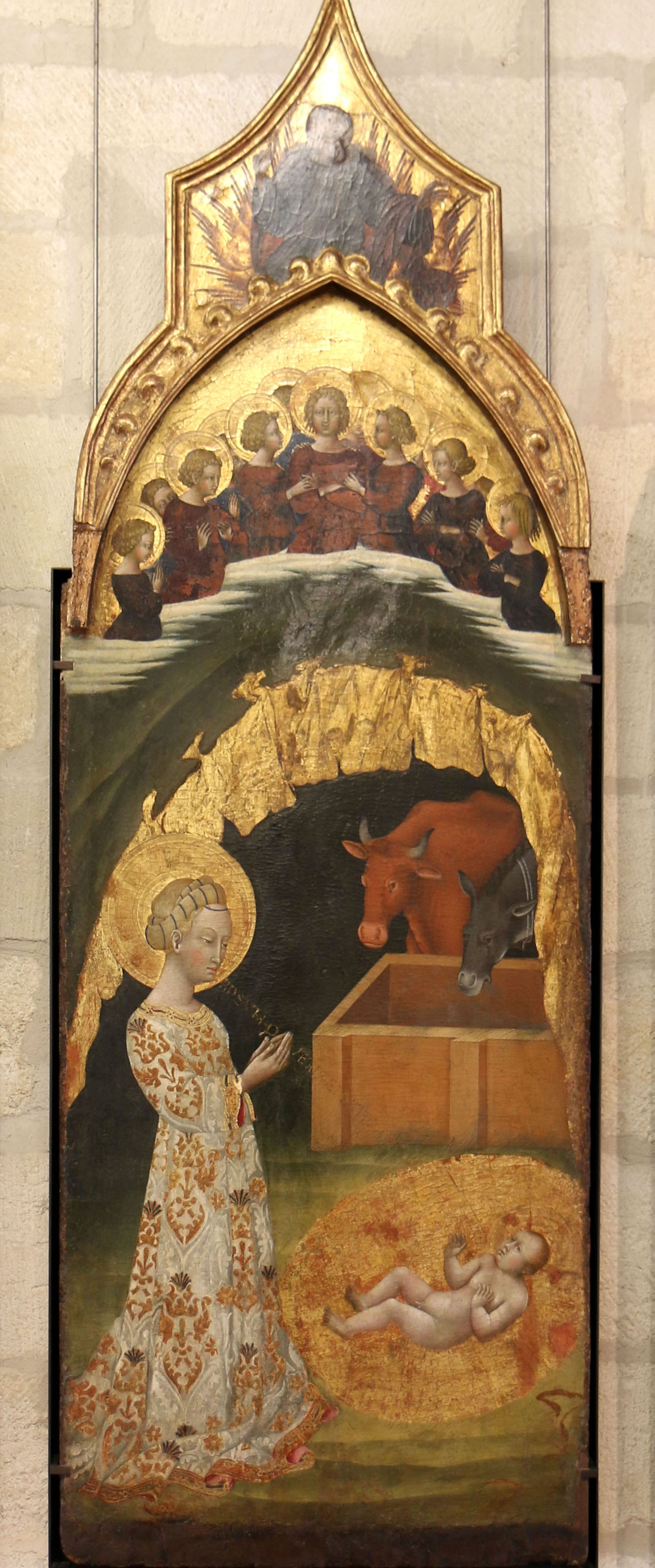 Detail of a painting by Giovanni di Paolo from Sienna (c. 1420-1480), which depicts the Virgin Mary wearing a polychrome, voided velvet gown. Photograph courtesy Petit Palais, Avignon.