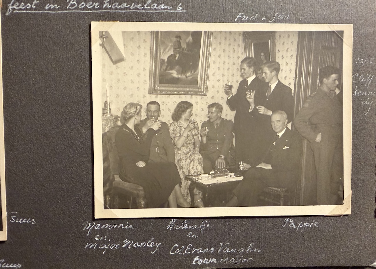 Fig. 15. Small party after liberation and after the house had been returned to the family. From left to right: Thérèse Barge-Dreesmann, Major Manley, Hélène Barge, Colonel Evans Vaughn (the Town Major), Fred and Jim Barge (both standing), Ton Barge, Cliff Kennedy. Photograph courtesy Nauta-Barge family.