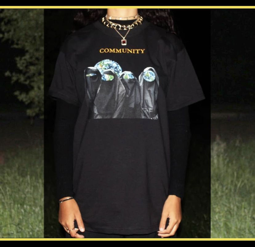 Model wearing a T-shirt designed by Kazna Asker.