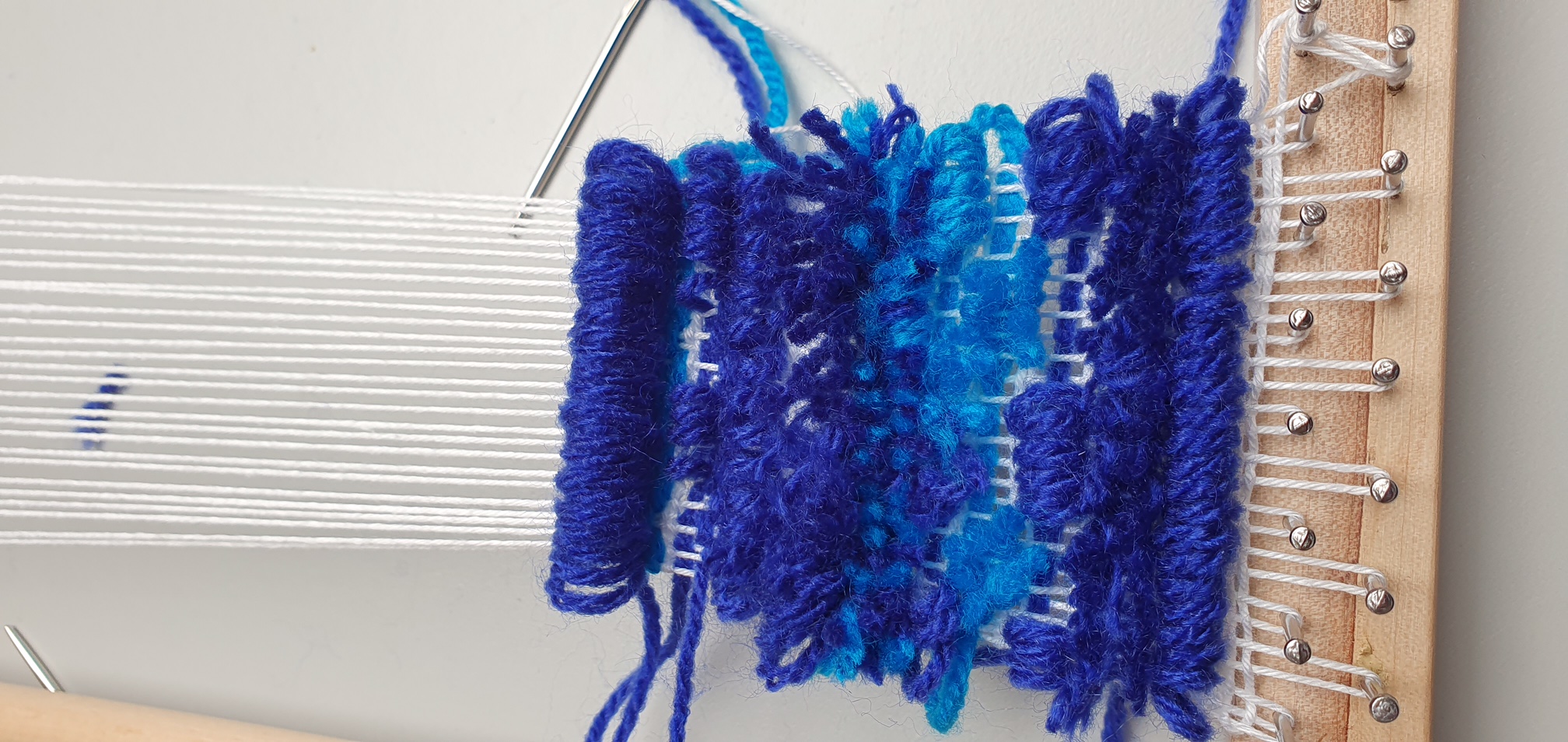 Starting to cut certain loops, while leaving others uncut. Photograph by the author.