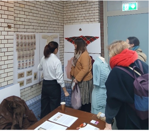 Fig. 4. Welcoming visitors to the TRC stand during Textile Inspiration Day. Photograph by Augusta de Gunzbourg.
