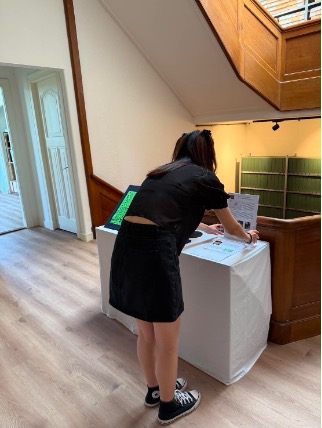 Fig. 6. Installing exhibition texts and making the final adjustments before the exhibition opening. Photograph by Han Chun, Hsieh.                                                                                                                                                                    