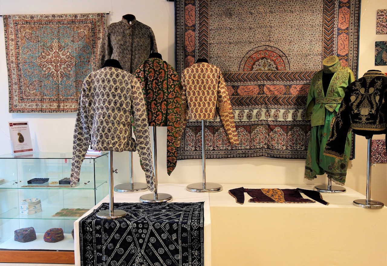 Iranian, Turkish and Afghan garments and textiles decorated with the buteh (paisley) motif. These are mainly late 19th and early 20th century in date. The blue and white Turkish panel in the middle is late 20th century in date.