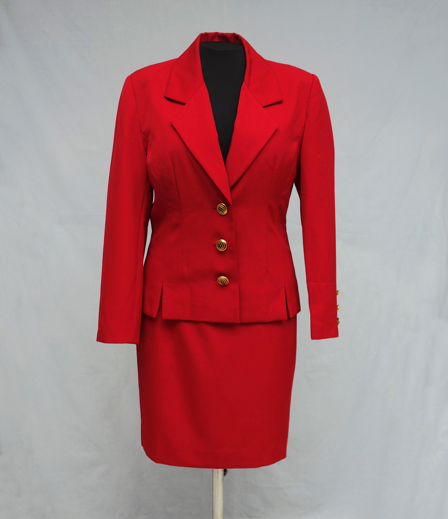 Red jacket and skirt made in imitation of a jacket and skirt worn by Princess Diana in mid-1990s (TRC 2021.2970a-b).
