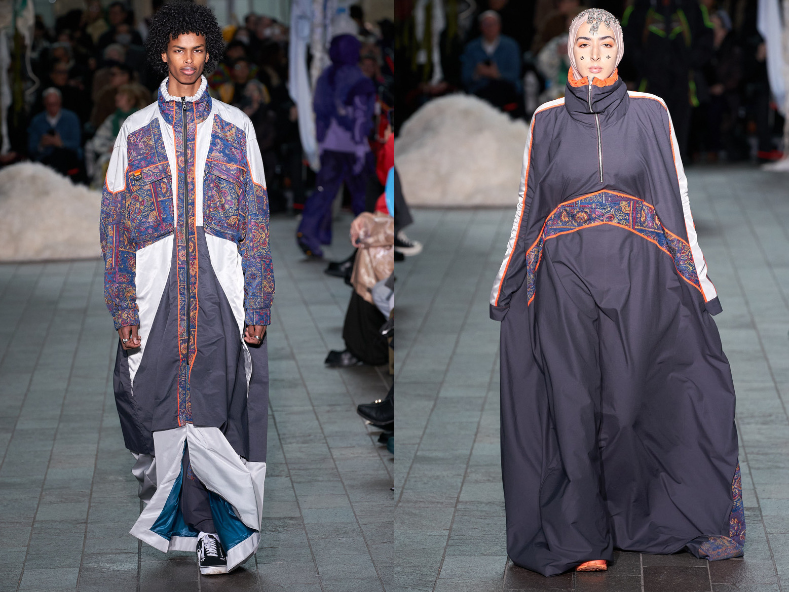 Two models showing part of Kazna Asker's collection during London Fashion Week (18-22 February).