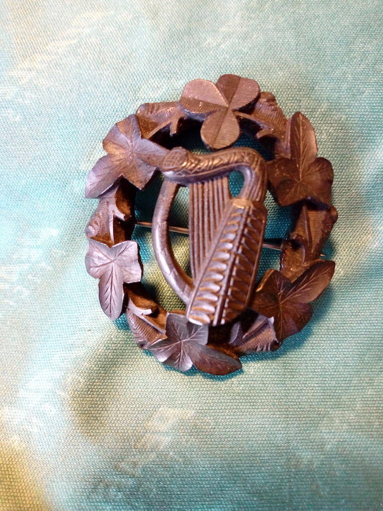 Example of bog oak jewellery from Ireland, with the Irish harp and shamrock (private collection).