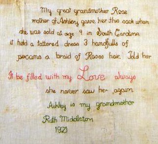 Detail of Rose and Ashley's sack, embroidered with a text by Ashley's granddaughter.