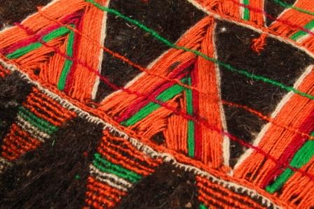Embroidery from a woman's waistcoat, from Asir, Saudi Arabia. TRC collection. Photograph: Joost Kolkman.