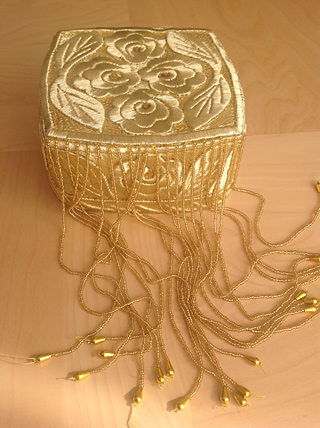 A modern example of headgear (doppe) from Uzbekistan, decorated with gold coloured metal thread. TRC collection.