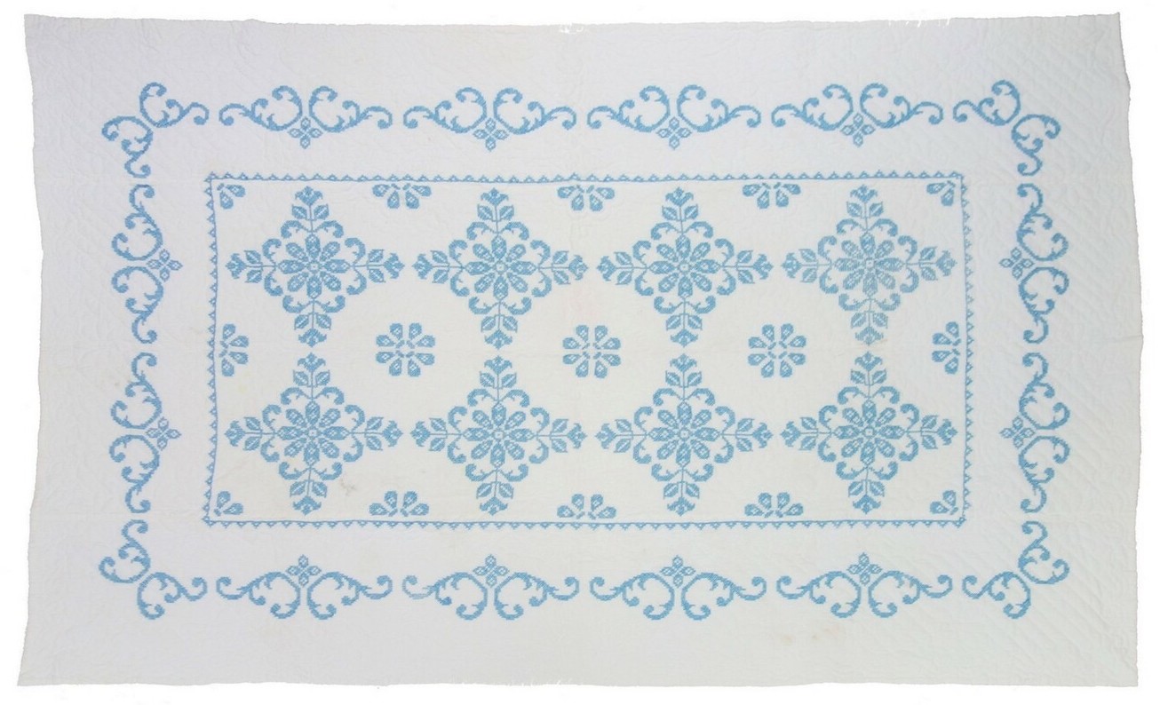 A 1950's embroidered quilt made from a kit, USA (TRC 2019.2926).