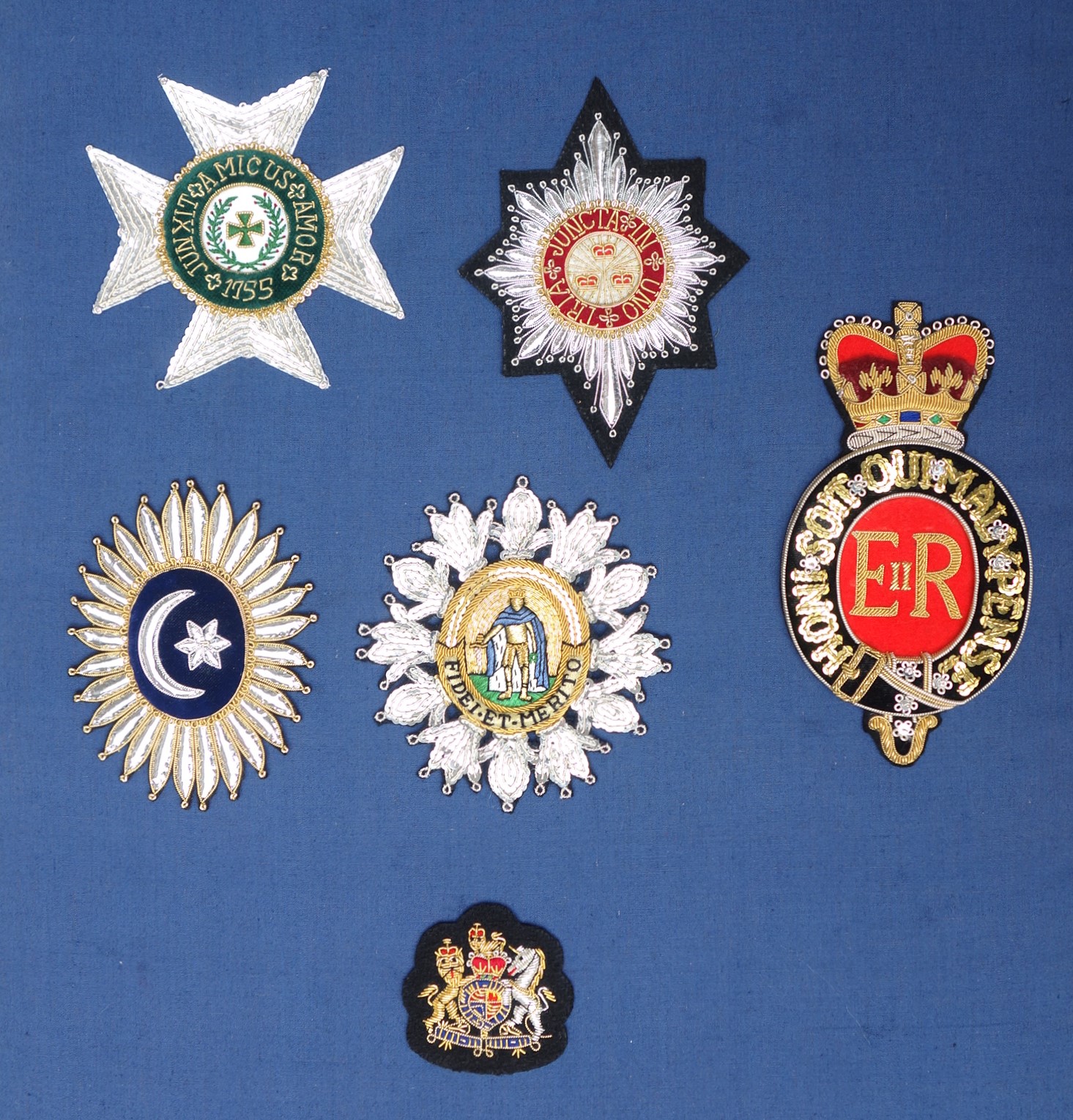 Replicas of embroidered insignia of chivalric orders, made by Hand & Lock.