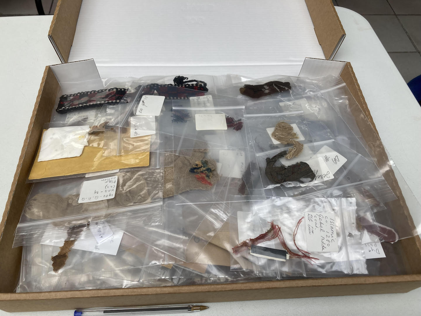 Fragments of textiles from Jebel Adda and Qasr Ibrim, first millennium and early second millennium AD, intended for fibre and dye analysis, from the TRC collection.